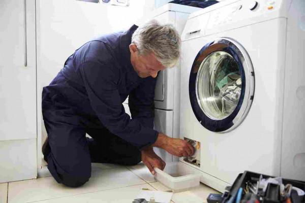 plumber-fixing-domestic-washing-machine-2021-08-26-16-13-07-utc (1)